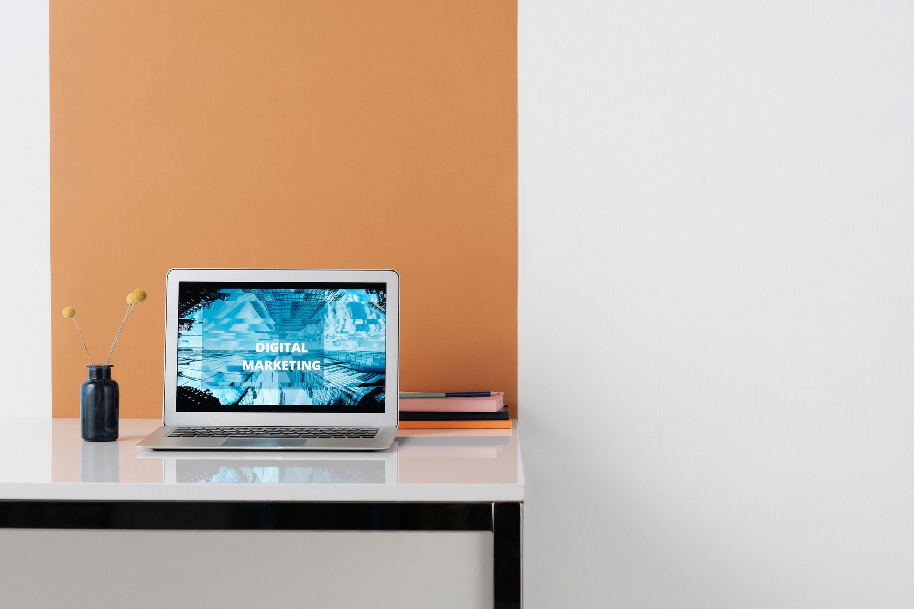 Modern laptop workspace displaying digital marketing content